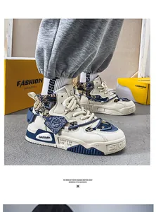 Sneaker alte retrò con dettaglio di design patchwork in tela blu e pelle
