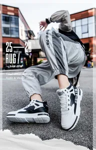 Urban style men's mid-top white skate shoes in black and white microfiber leather