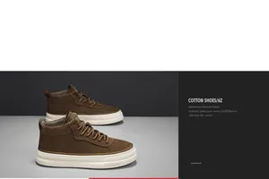 Detailed view of brown suede mid-top sneakers featuring chunky white rubber soles.