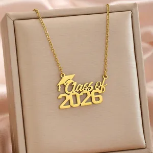 Macro view of gold stainless steel Class of 2026 pendant necklace for graduation