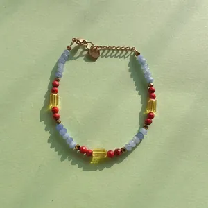 Colorful faceted natural stone beaded bracelet with gold heart charm and lobster clasp
