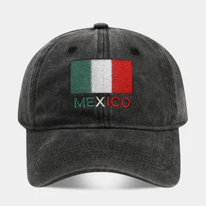 Macro view of the precise Mexico flag and name embroidery on a black vintage washed cotton cap