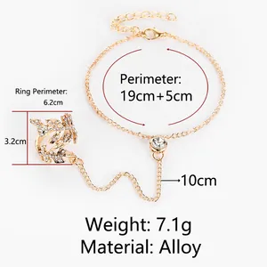 Detailed size specs of gold alloy slave bracelet with rhinestone leaf design.