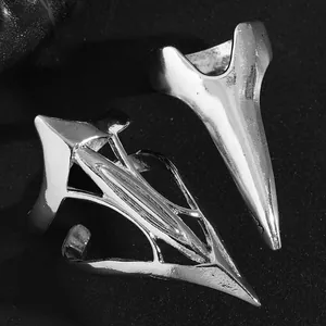 Close-up of punk style silver claw nail rings with sharp metallic finish