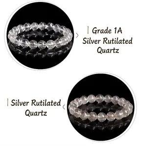 Close-up comparison of two silver rutilated quartz bead bracelets on black reflective surface