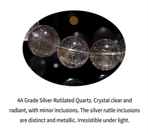 Macro detail of natural silver rutilated quartz beads showing internal needle inclusions.