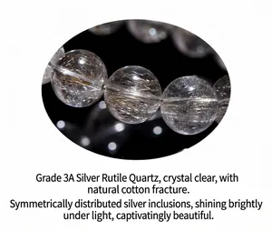Macro detail of natural silver rutilated quartz beads with transparent crystal texture