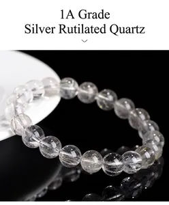 Detailed macro shot showing the fine texture of natural silver rutilated quartz beads.