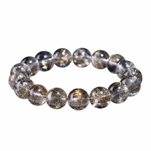 Natural silver rutilated quartz bead bracelet with internal needle inclusions.