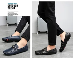 Close-up of men's casual leather loafers with metallic bit and contrast stitching