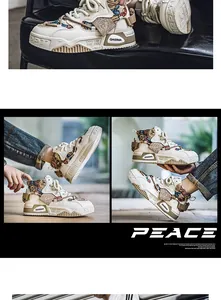 Sneakers alte vintage da uomo con giunzione in tela e pelle e motivo paisley a orsetto