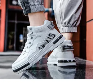 Close-up of men's white high-top sneakers in an urban setting with dynamic lighting.