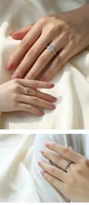 Close-up of moissanite ring on finger with sterling silver band and sparkling details