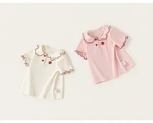Sweet girls' short-sleeved T-shirts with ruffled doll collars and strawberry detail.