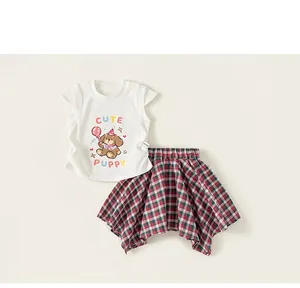 Set estivo per bambini in due pezzi con top stampato cucciolo e gonna a quadri.
