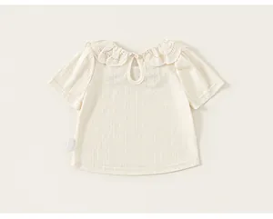 Detailed back view of baby girl's lace collar t-shirt with keyhole button