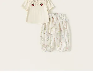 Two-piece baby girl summer set with cherry embroidery top and floral pants