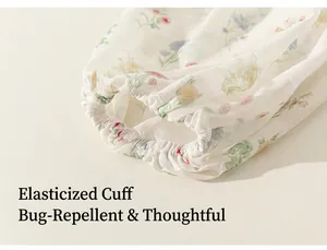Detailed macro view of elasticated floral print cuffs on lightweight summer children's wear.