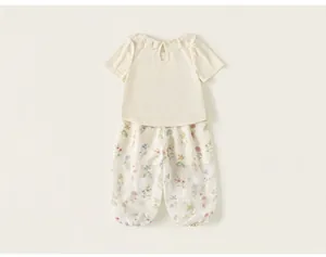 Toddler girl two-piece summer clothing set featuring lace collar top and floral harem pants