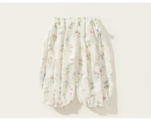 Close-up of girls floral lantern pants with elastic waist for summer