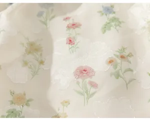 Detailed macro shot of elegant floral jacquard fabric for a summer girl's T-shirt