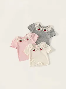 Set of three girls' summer cotton T-shirts featuring ruffled lace collars and cherry embroidery