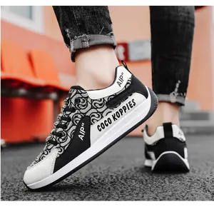 Low angle detail shot of designer men's casual canvas shoes with patterned print