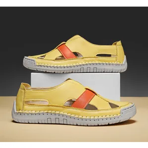 Macro detail of yellow leather sandals featuring hand-stitched soles and breathable cutouts