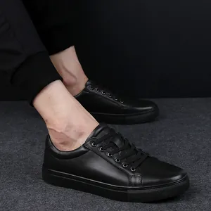 High-quality black cowhide leather low-top casual sneakers with a stylish lace-up design