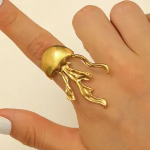 Close-up of gold-plated stainless steel jellyfish open ring showing intricate tentacle details