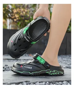 Detail of black and green breathable outdoor garden clogs for men with dual-wear strap
