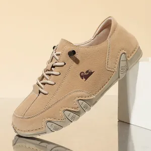 Close-up of tan suede casual shoe featuring a unique octopus-inspired jagged rubber sole