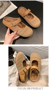 Detailed view of beige mesh mules with adjustable buckle and thick sole