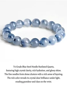 Close-up of natural blue rutilated quartz bracelet with fine hair-like inclusions.