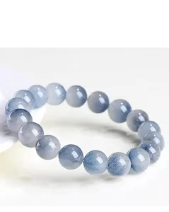 Macro view of natural 5A grade blue rabbit hair rutilated quartz beaded bracelet