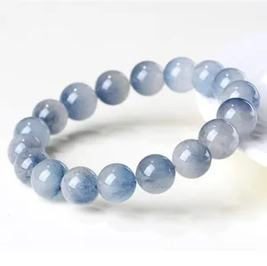 Macro detail of natural blue rabbit hair rutilated quartz beaded bracelet for healing
