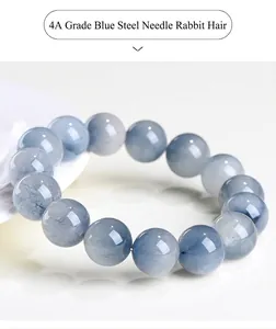 Close-up of natural blue rutilated quartz bead bracelet with high-quality inclusions.