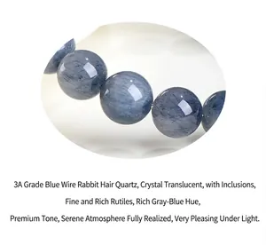 Macro view of natural 3A blue rutilated quartz beads with rich fibrous textures