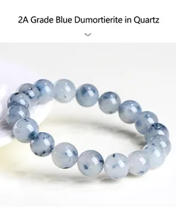Close-up of natural blue rutilated quartz bead bracelet showing unique crystal texture
