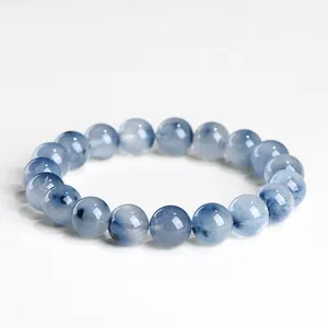 Natural blue rutilated quartz beaded bracelet featuring rabbit hair crystal inclusions