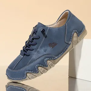Detailed side view of blue leather casual shoe with octopus sole and wide toe box.