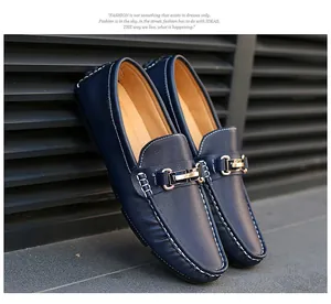 Premium navy blue men's slip-on loafers with white contrast stitching and gold buckle