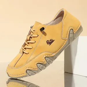 Detail view of yellow casual leather shoe with unique scalloped octopus sole design.