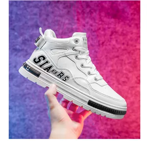 Macro view showing the side detail of white high-top sneakers in micro-fiber leather