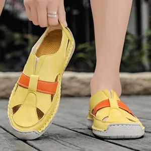 Yellow breathable casual sandals with handmade stitching for summer beach and outdoor use