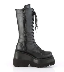Side view of black gothic platform knee-high boots with laces and side zipper