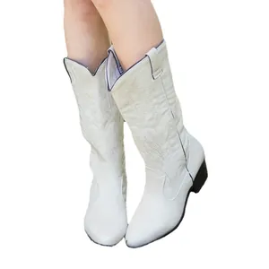 Classic white western cowboy boots for women with medium block heel and PU leather.