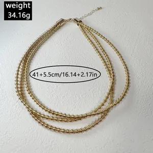 Detailed view of stylish triple-layer gold metal choker with size and weight specs