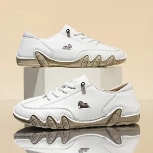 Men's white low-top casual shoes featuring octopus wave soles and ram logo detail