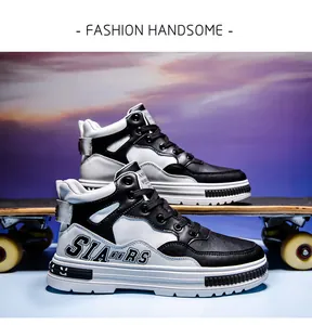 Close-up of men's black and white mid-top skateboard shoes made of microfiber leather